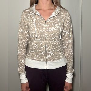 Tan cheetah print fitted zip up with hood